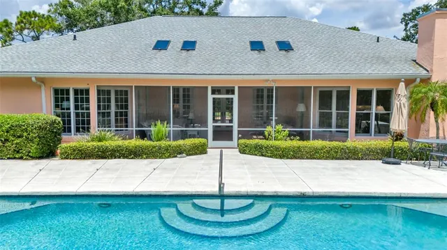 a view of a livingroom with shelves