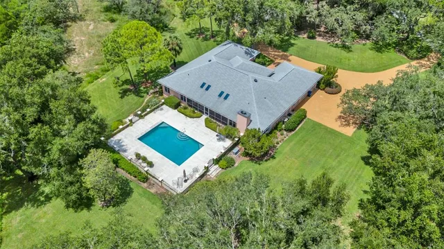a kitchen with a sink cabinets and window