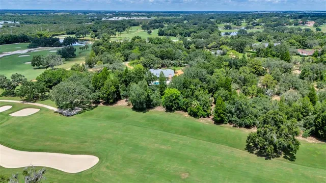 a view of a livingroom with furniture window and outside view