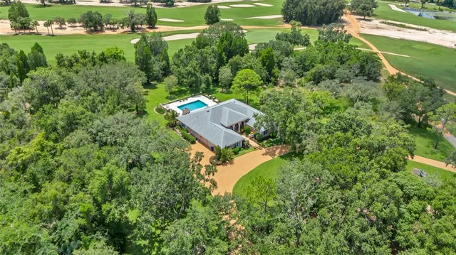 a living room with fireplace furniture and a flat screen tv