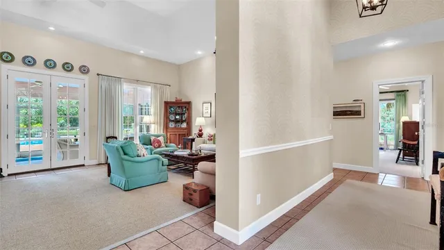 a living room with furniture or couch and a bookshelf