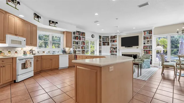 a bedroom with a bed and a table