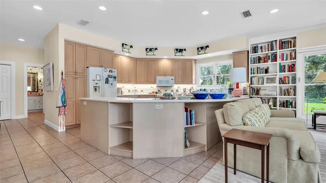 a bedroom with two beds and a couch