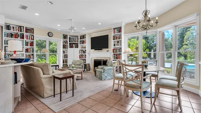 a living room with furniture and white walls