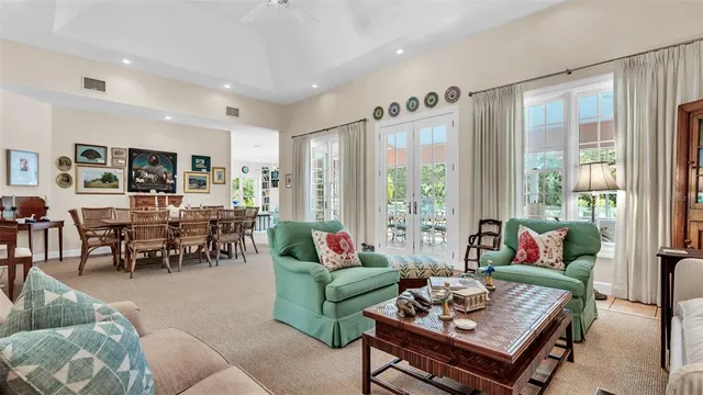 a view of a chairs and table in a backyard