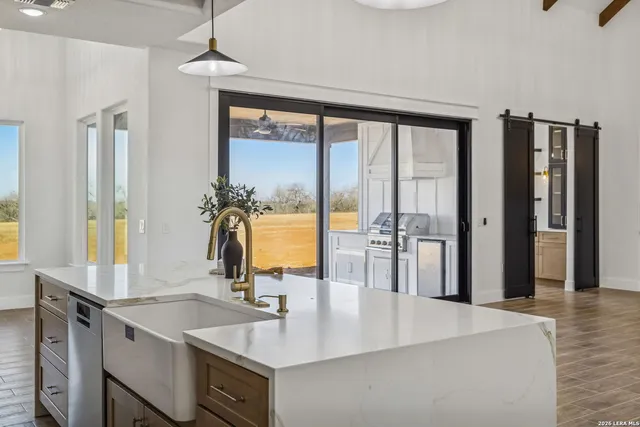 a view of a kitchen and dining room
