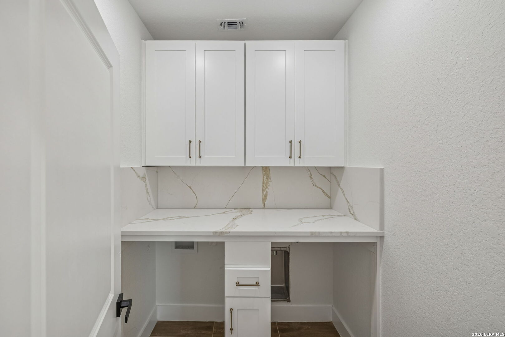 187 Hidden Ranch Court Floresville, TX 78114 - Photo 22 of 37 a view of utility room