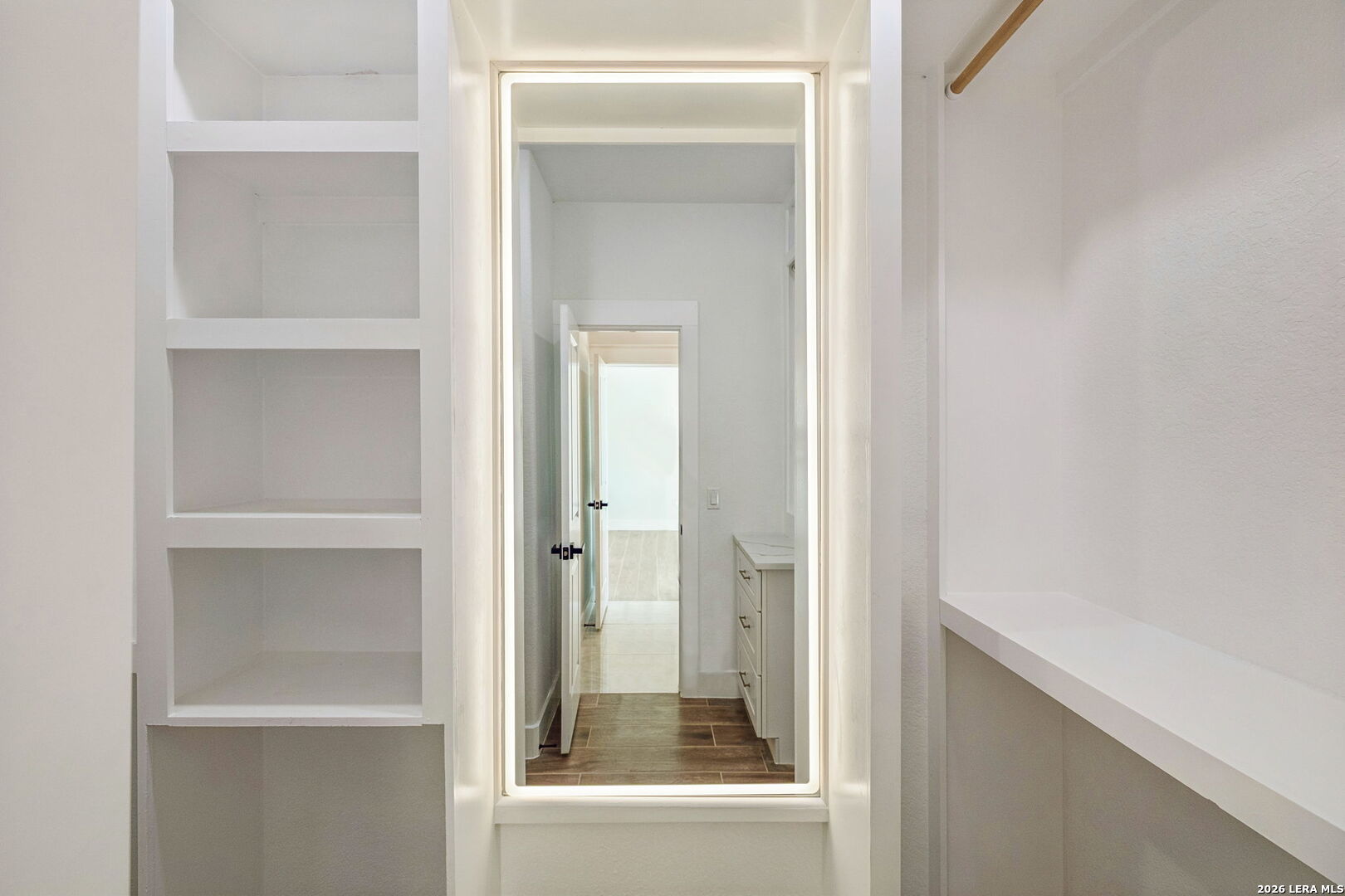 187 Hidden Ranch Court Floresville, TX 78114 - Photo 27 of 37 a bathroom with a glass shower door