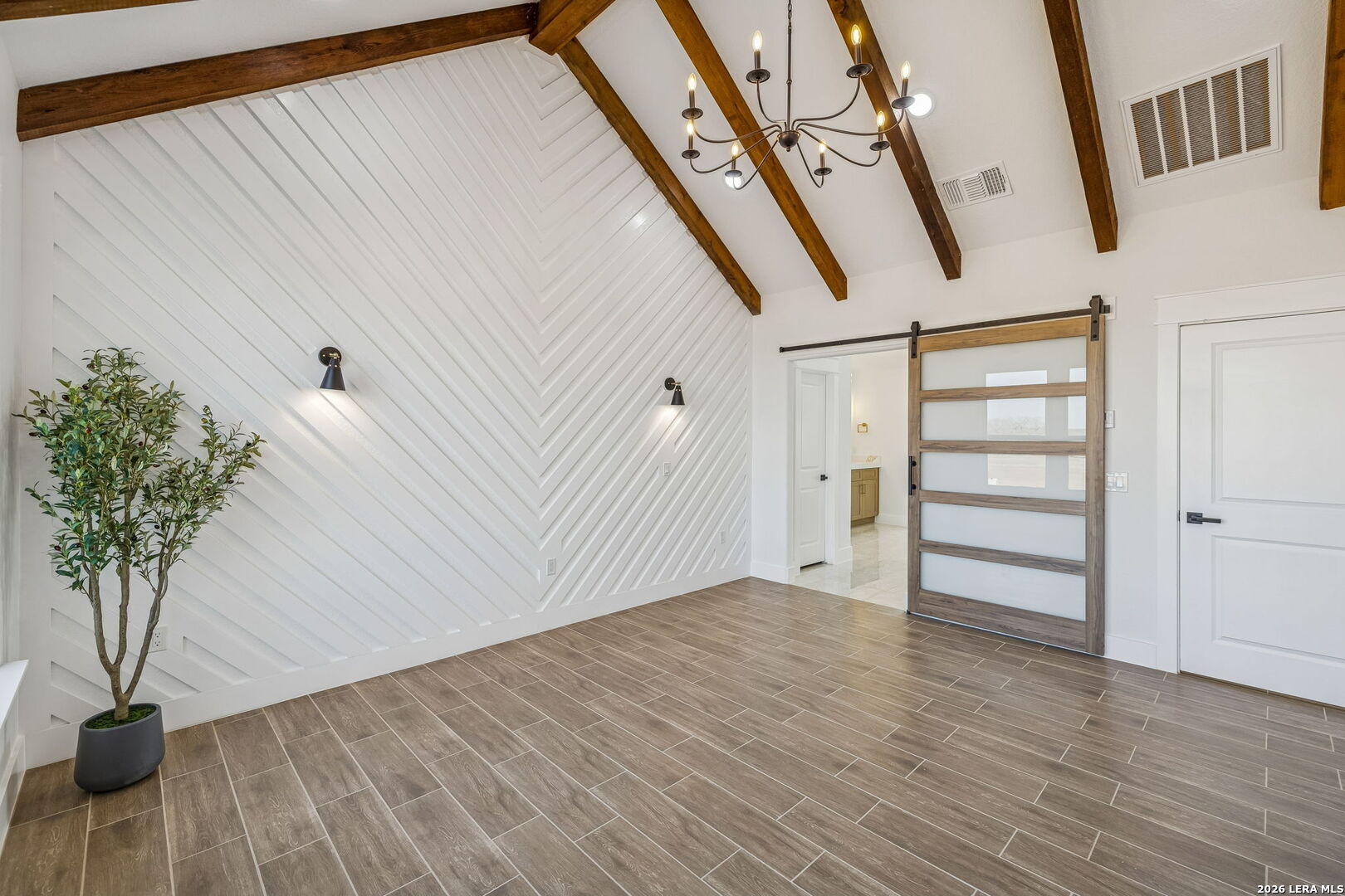 187 Hidden Ranch Court Floresville, TX 78114 - Photo 28 of 37 a view of an entryway with wooden floor