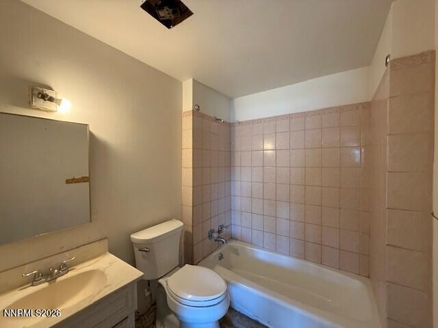 1809 K Street Sparks, NV 89431 - Photo 17 of 18 a bathroom with a sink a toilet and shower