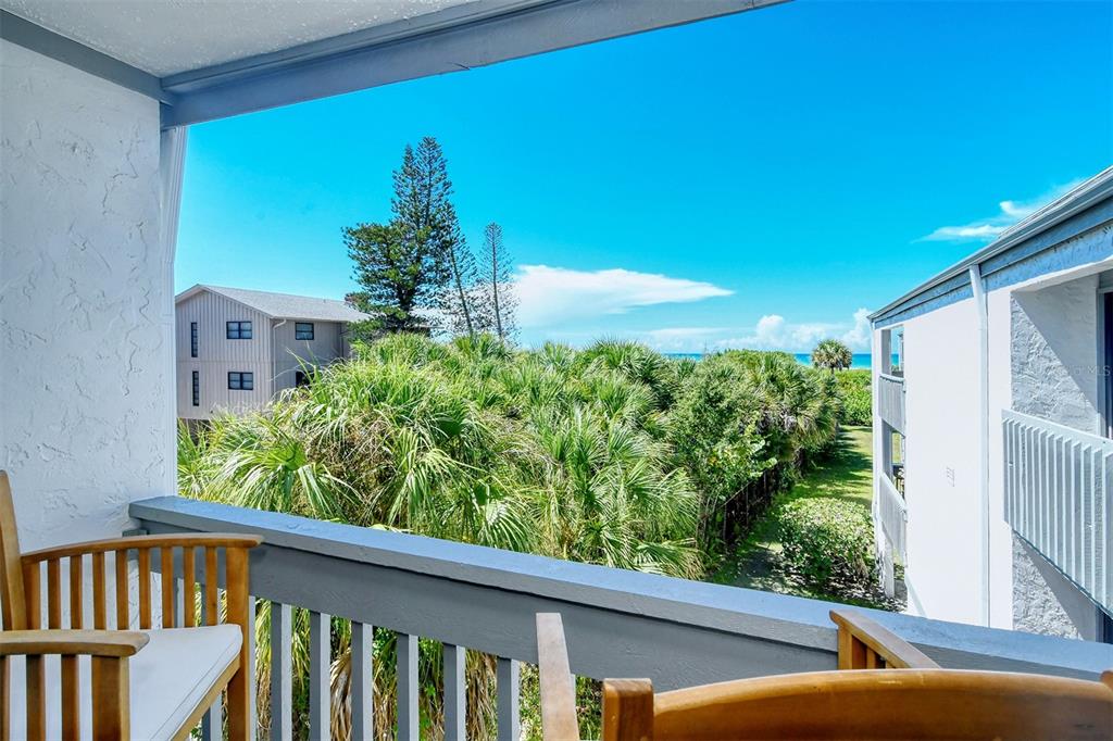 450 Beach Road, Unit 5 Sarasota, FL 34242 - Photo 22 of 59 Porch off the Master bedroom overlooking the Gulf of Mexico.