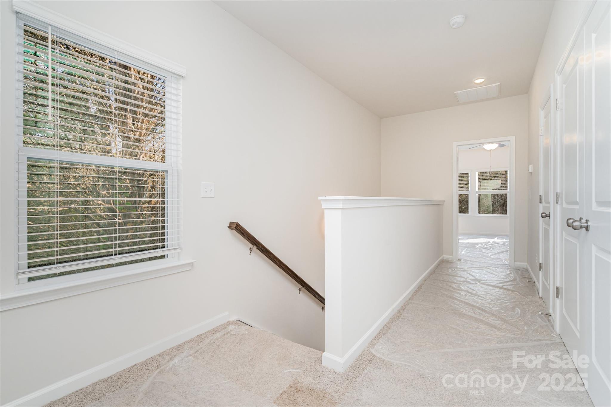 7312 Boswell Road Charlotte, NC 28215 - Photo 18 of 33 a view of an empty room with a window