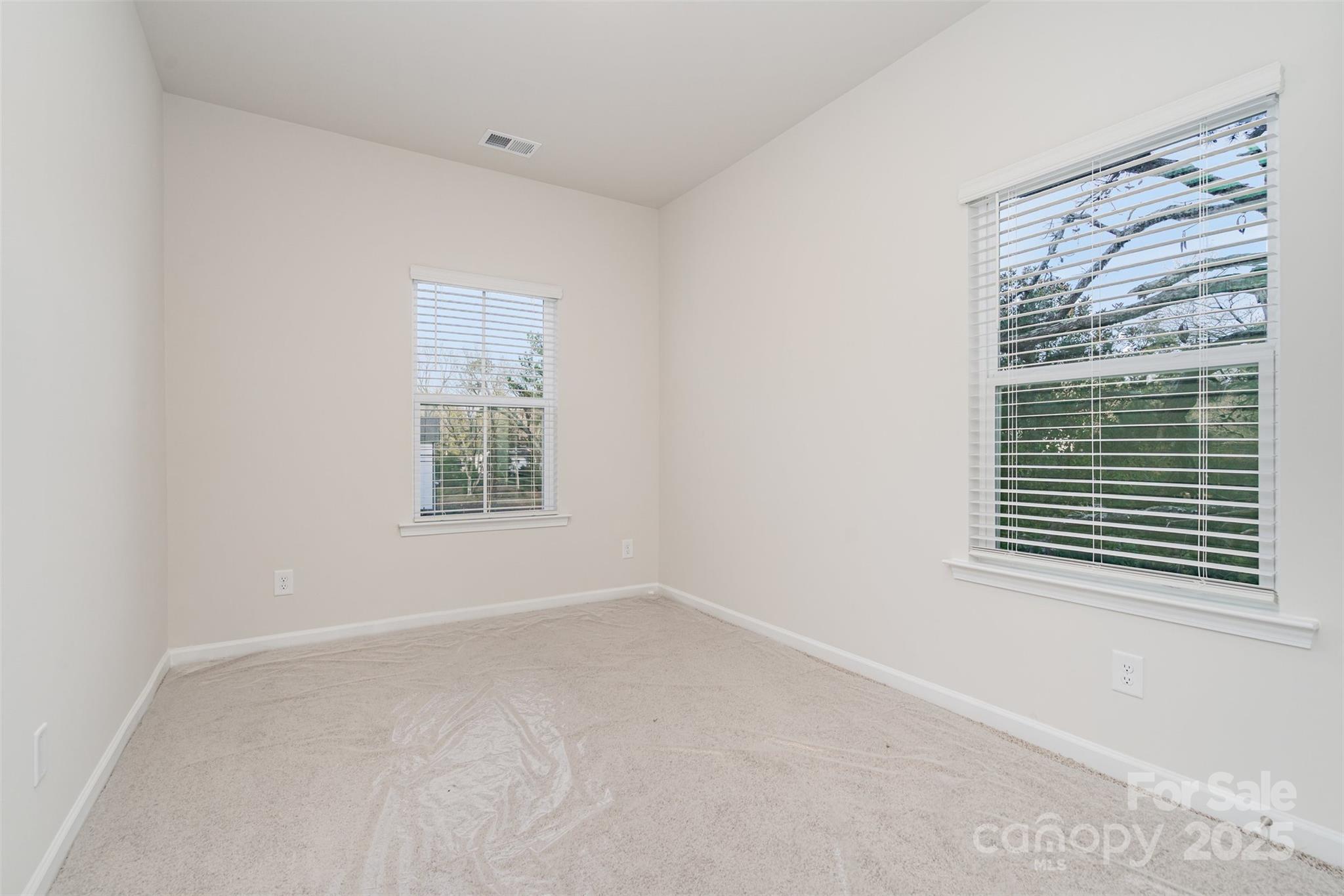7312 Boswell Road Charlotte, NC 28215 - Photo 25 of 33 a view of an empty room with a window