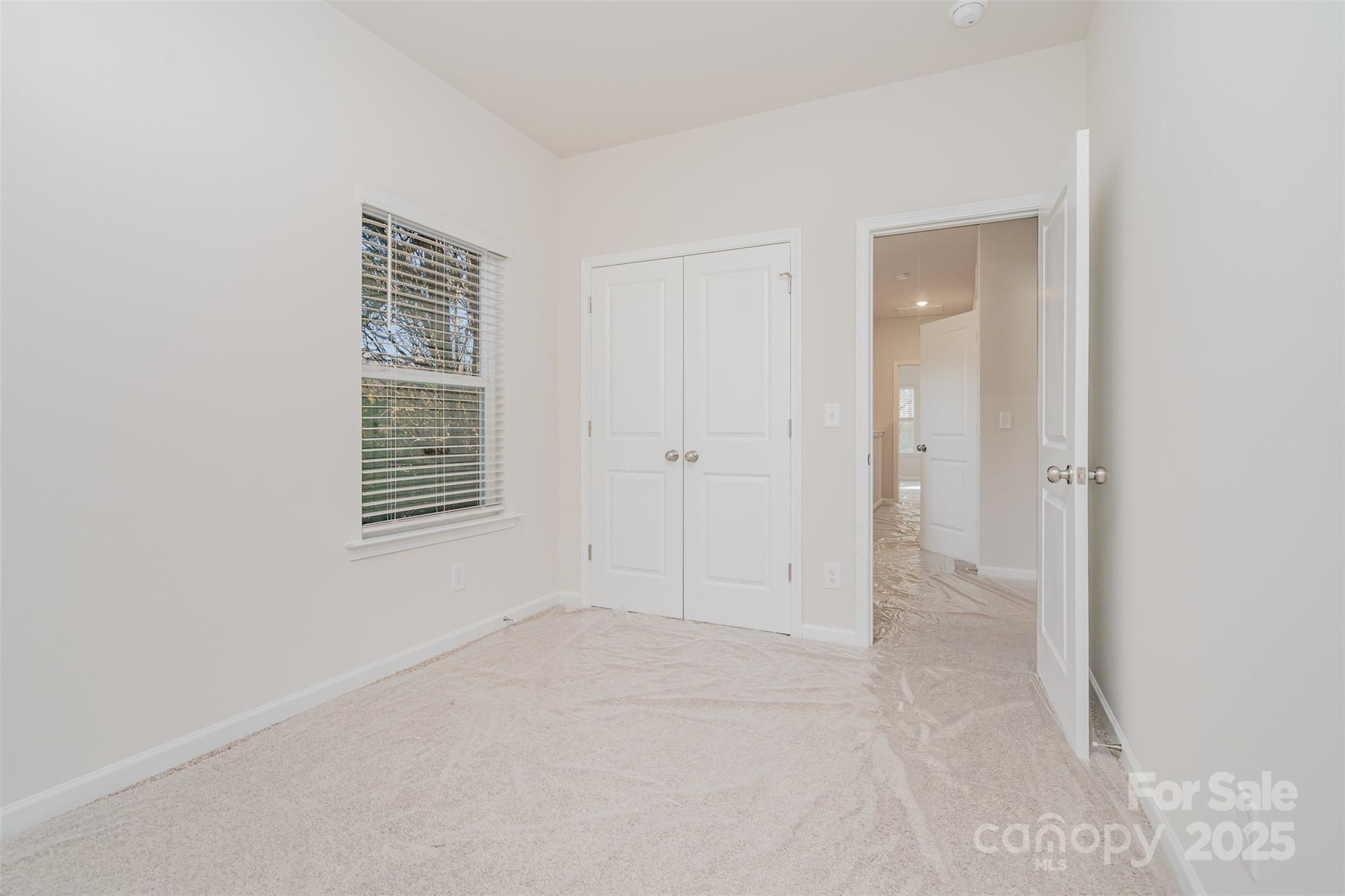 7312 Boswell Road Charlotte, NC 28215 - Photo 26 of 33 a view of an empty room with a window