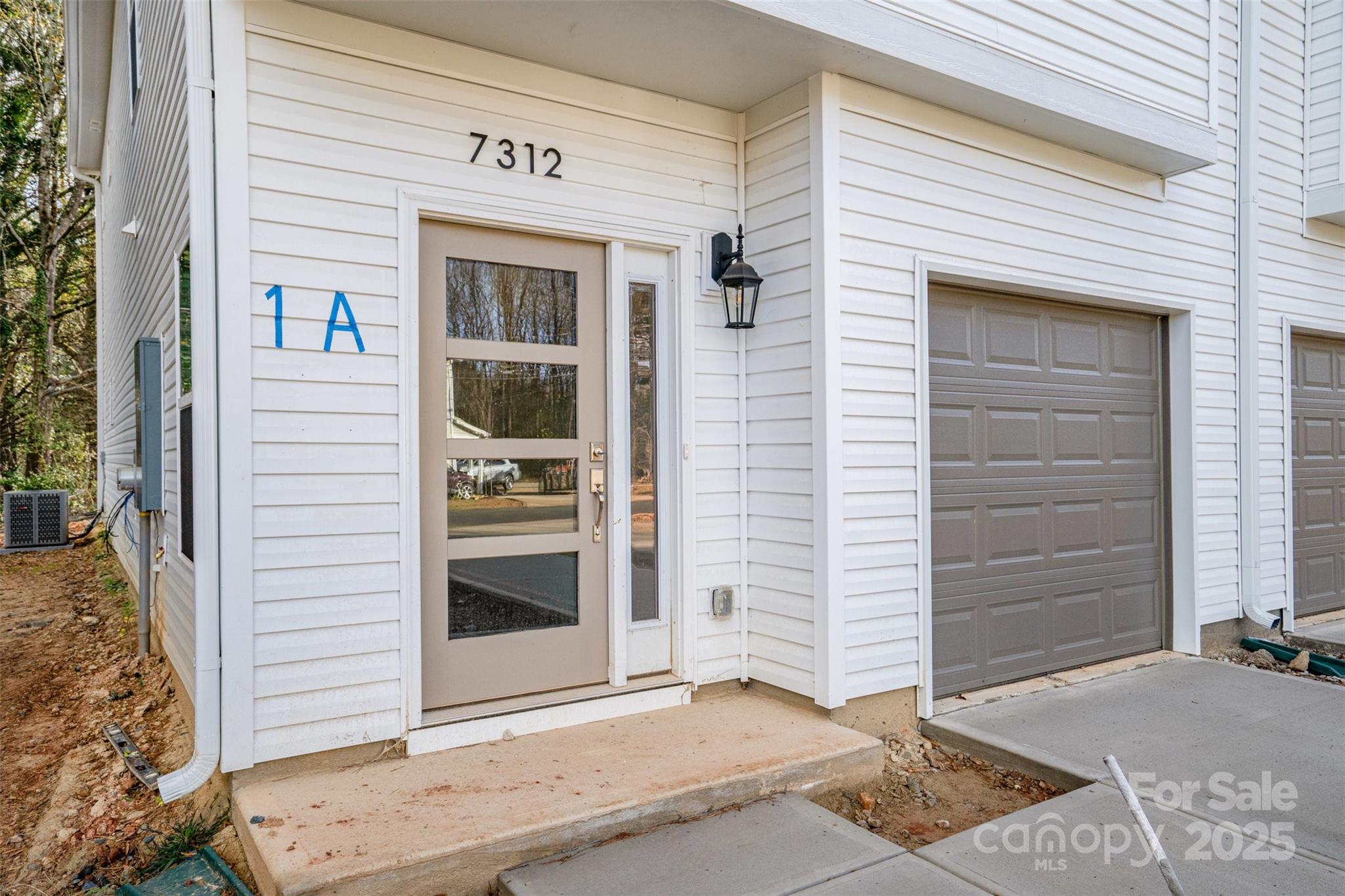 7312 Boswell Road Charlotte, NC 28215 - Photo 3 of 33 a front view of a house