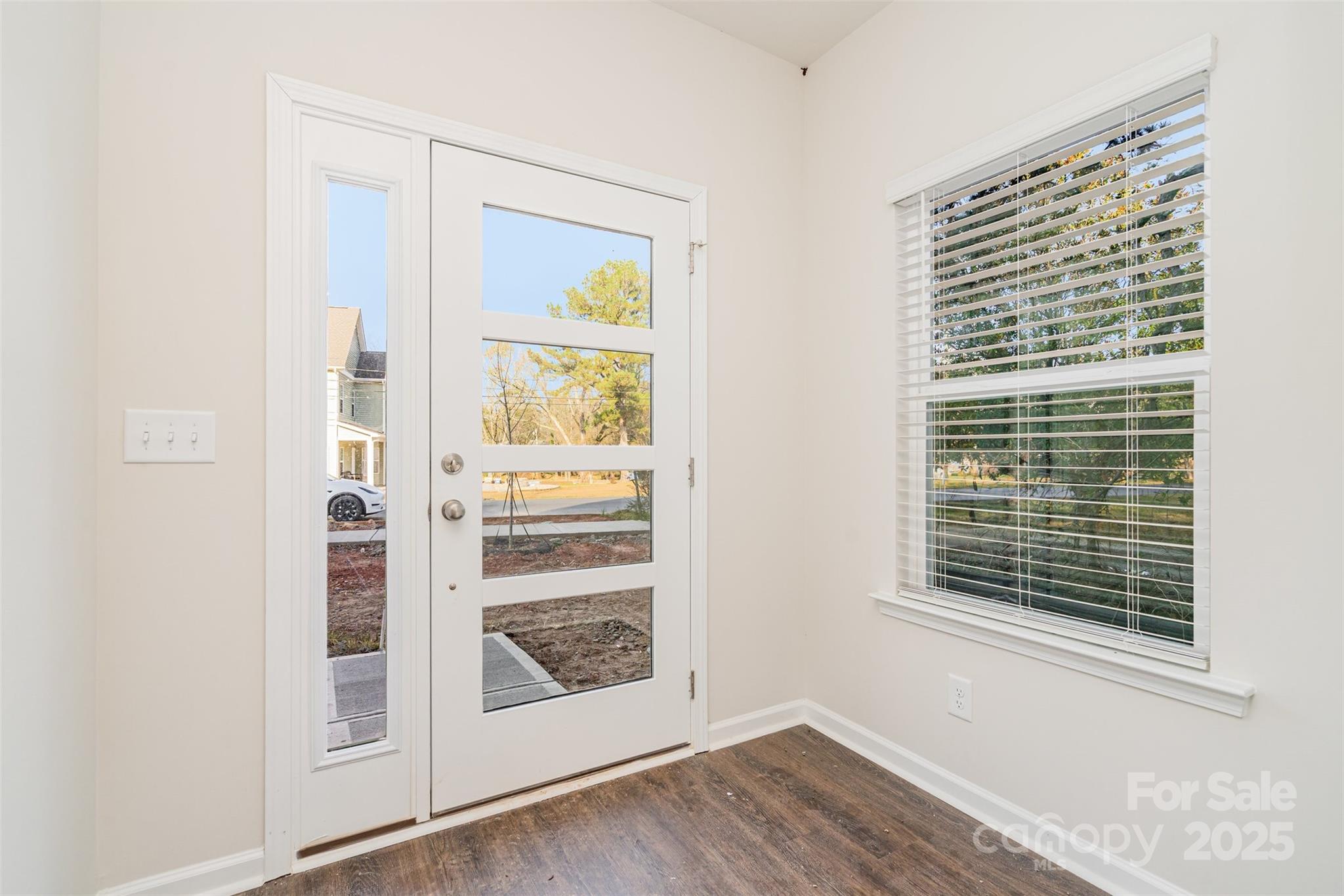 7312 Boswell Road Charlotte, NC 28215 - Photo 4 of 33 a view of a room that has a window in it