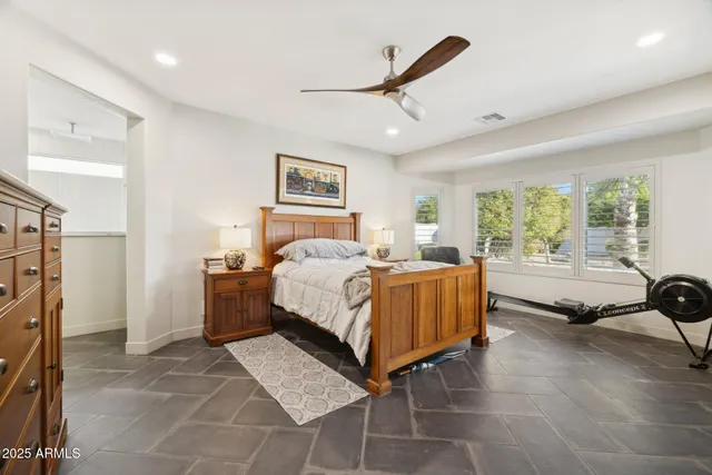a kitchen with counter top space and living room