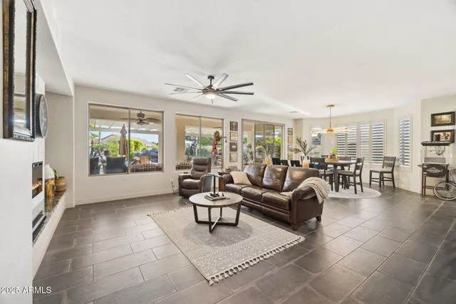 a living room with furniture and a window
