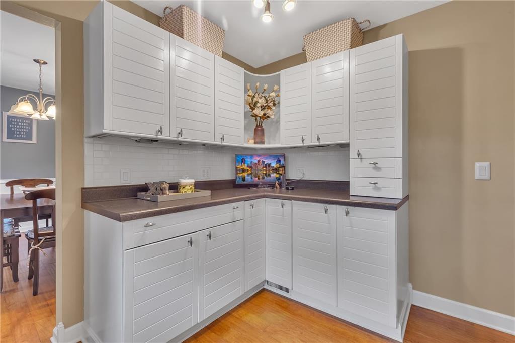 106 Truman Street Monaca, PA 15061 - Photo 13 of 25 a kitchen with granite countertop a sink stainless steel appliances and cabinets