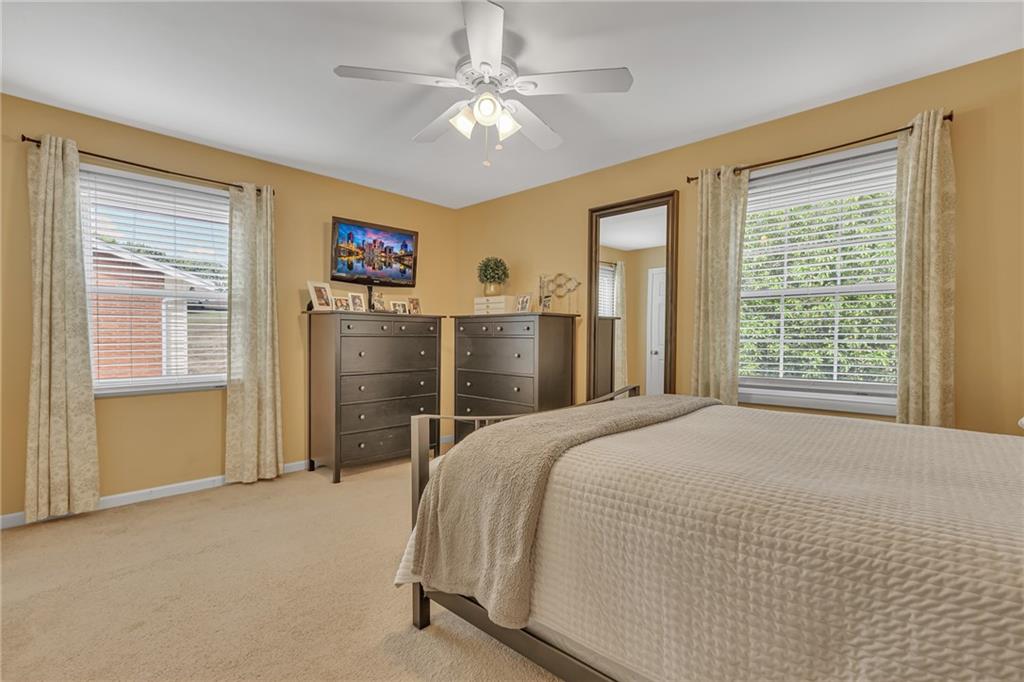 106 Truman Street Monaca, PA 15061 - Photo 24 of 25 a bedroom with a large bed closet and dresser