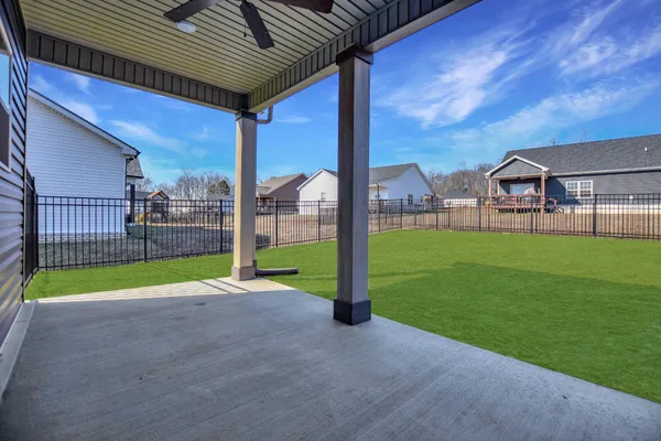 a view of a backyard with porch