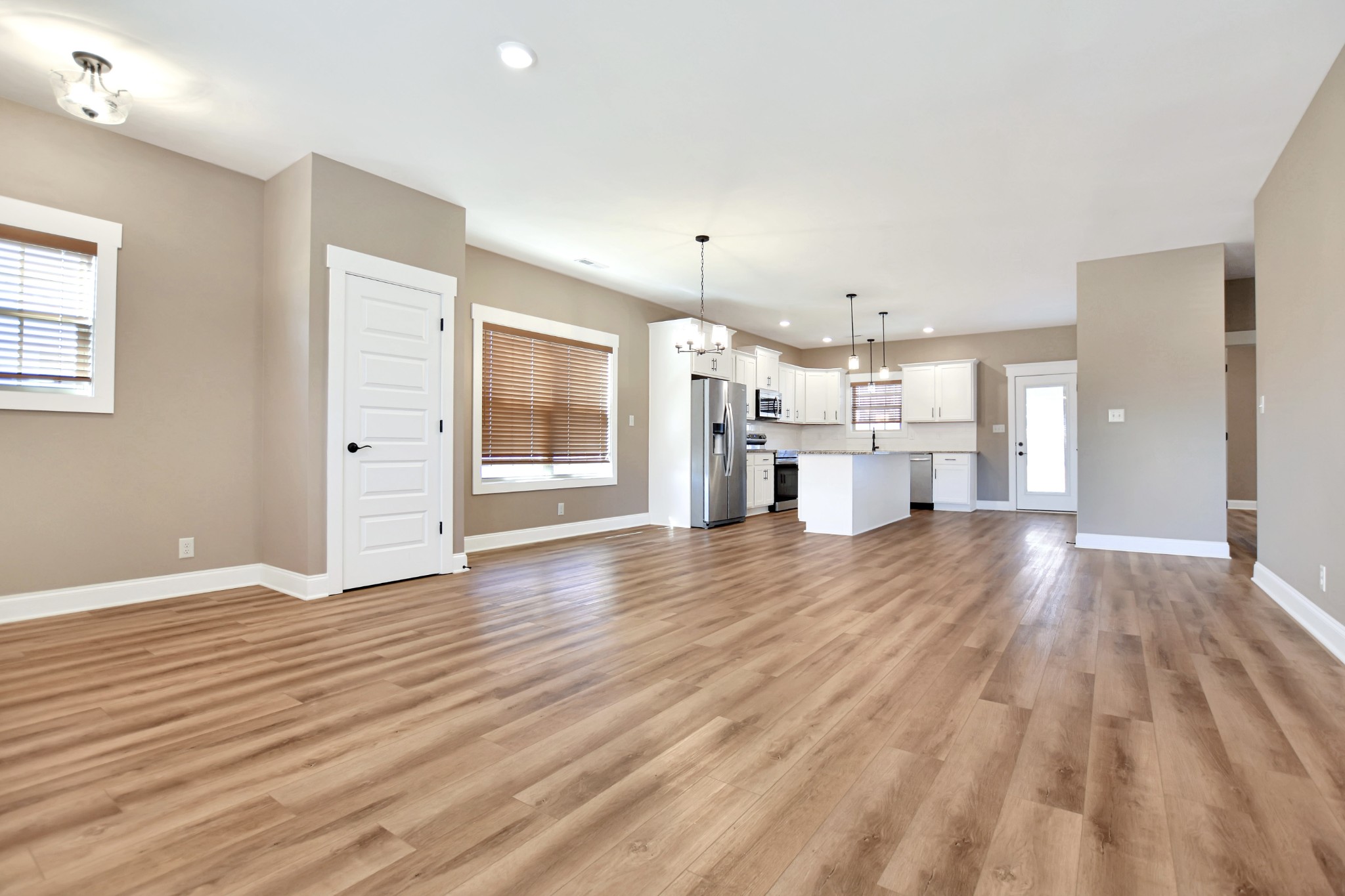 3495 Rabbit Run Trail Clarksville, TN 37043 - Photo 7 of 27 a view of a kitchen with a sink and a stove top oven