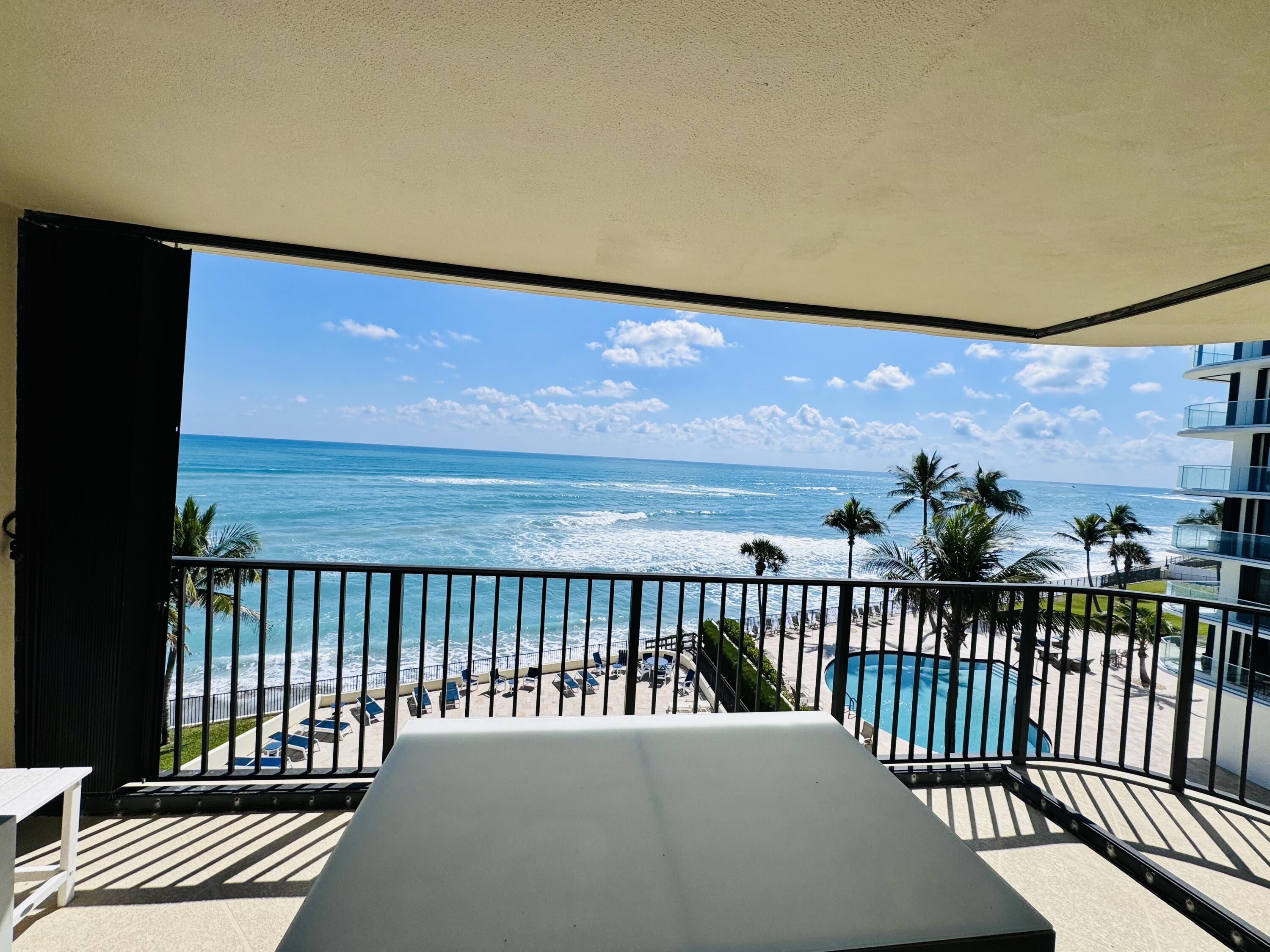 200 South Beach Road, Unit 403 Tequesta, FL 33469 - Photo 27 of 46 a view of a balcony with wooden floor