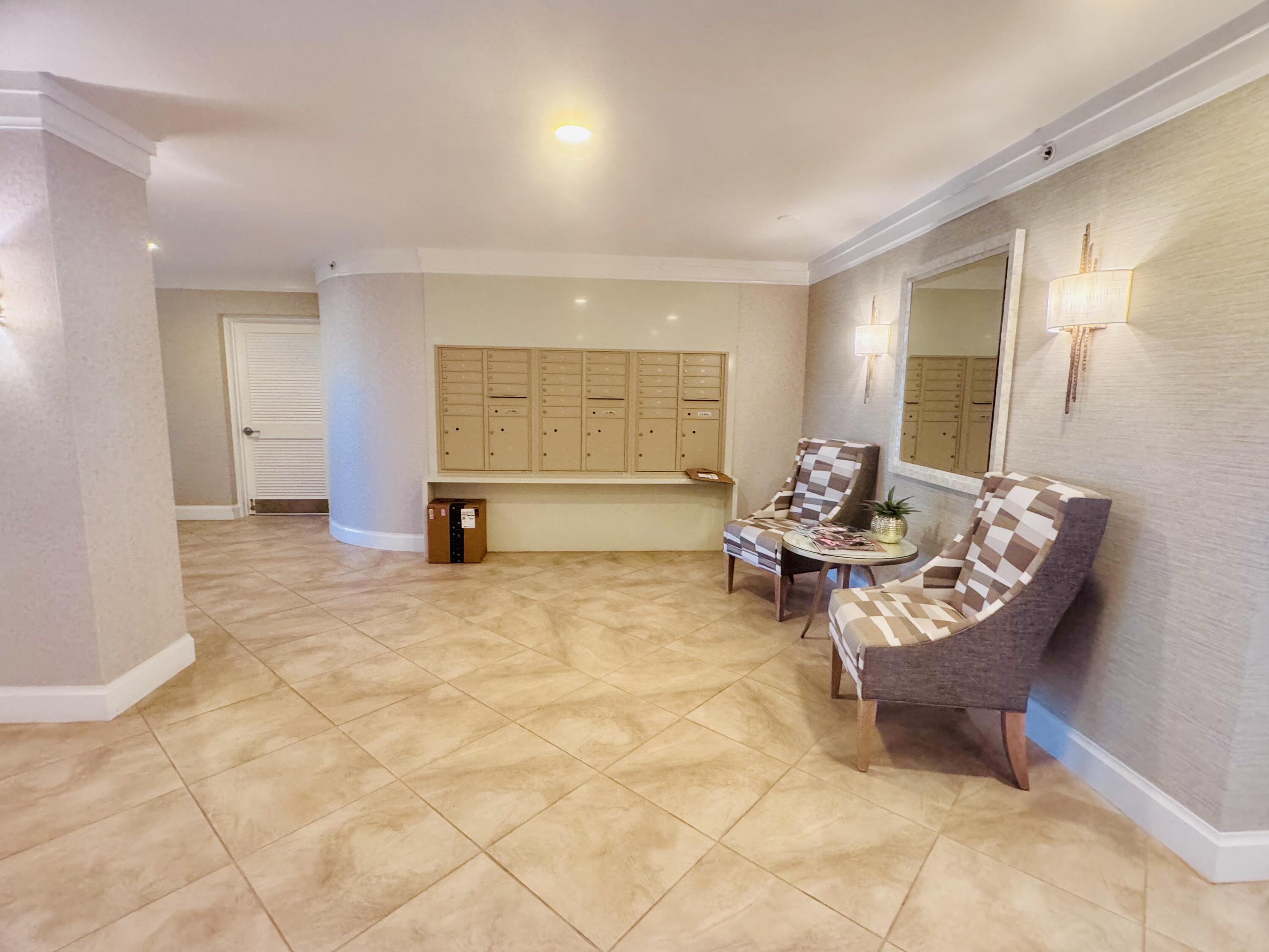 200 South Beach Road, Unit 403 Tequesta, FL 33469 - Photo 4 of 46 a living room with furniture and a window