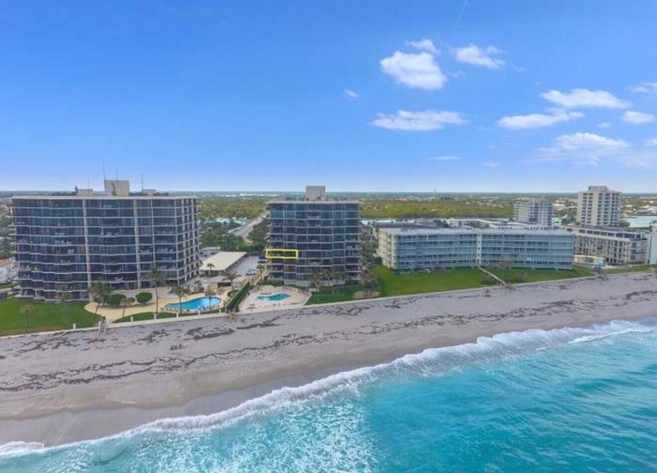 200 South Beach Road, Unit 403 Tequesta, FL 33469 - Photo 46 of 46 a view of a road with a building in the background