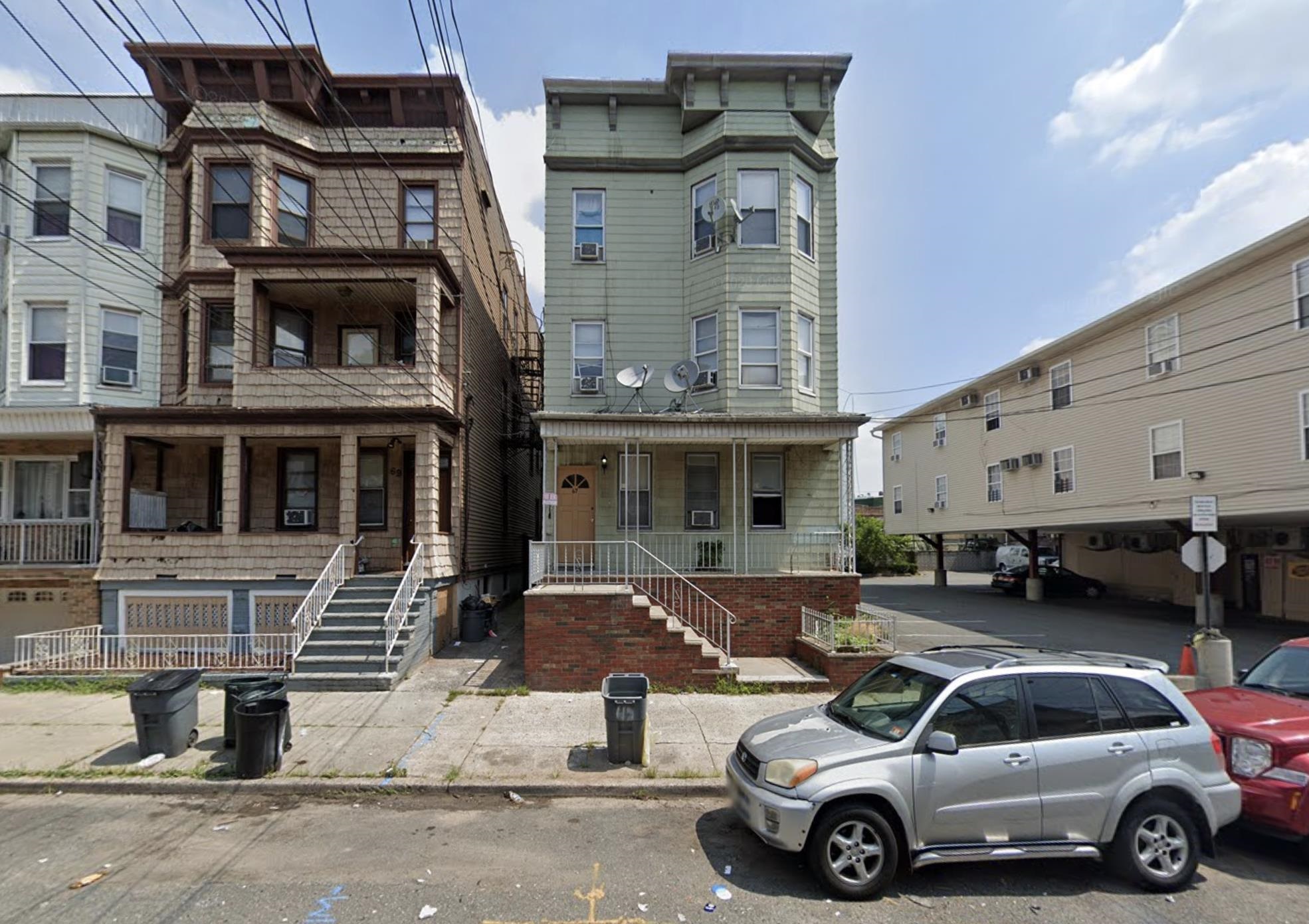 a car parked in front of a building