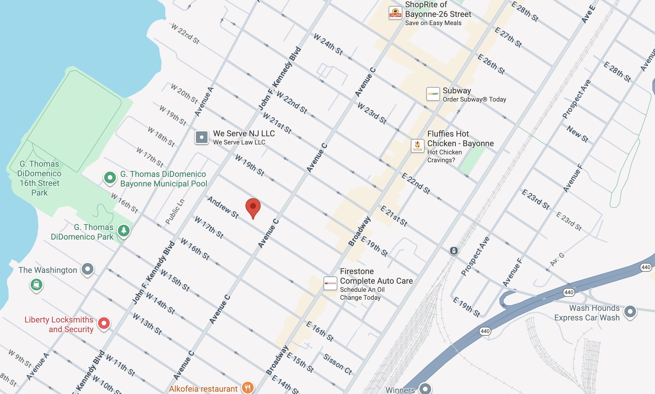 67 Andrew Street, Unit 1F Bayonne, NJ 07002 - Photo 2 of 2 a white and white bed sitting next to a white wall