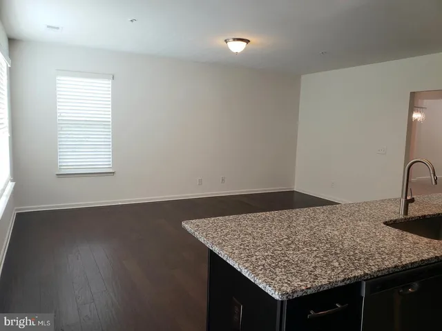 an empty room with a sink