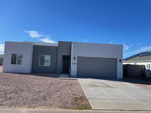 15200 South Diablo Road Arizona City, AZ 85123 - Photo 1 of 23 a front view of a house with a yard