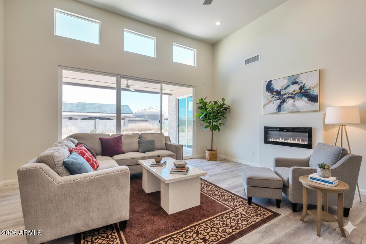 15200 South Diablo Road Arizona City, AZ 85123 - Photo 2 of 23 a living room with furniture and a large window