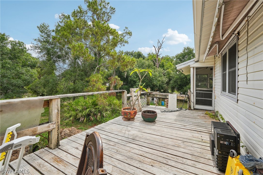 23701 North River Road Alva, FL 33920 - Photo 5 of 18 a view of deck with furniture