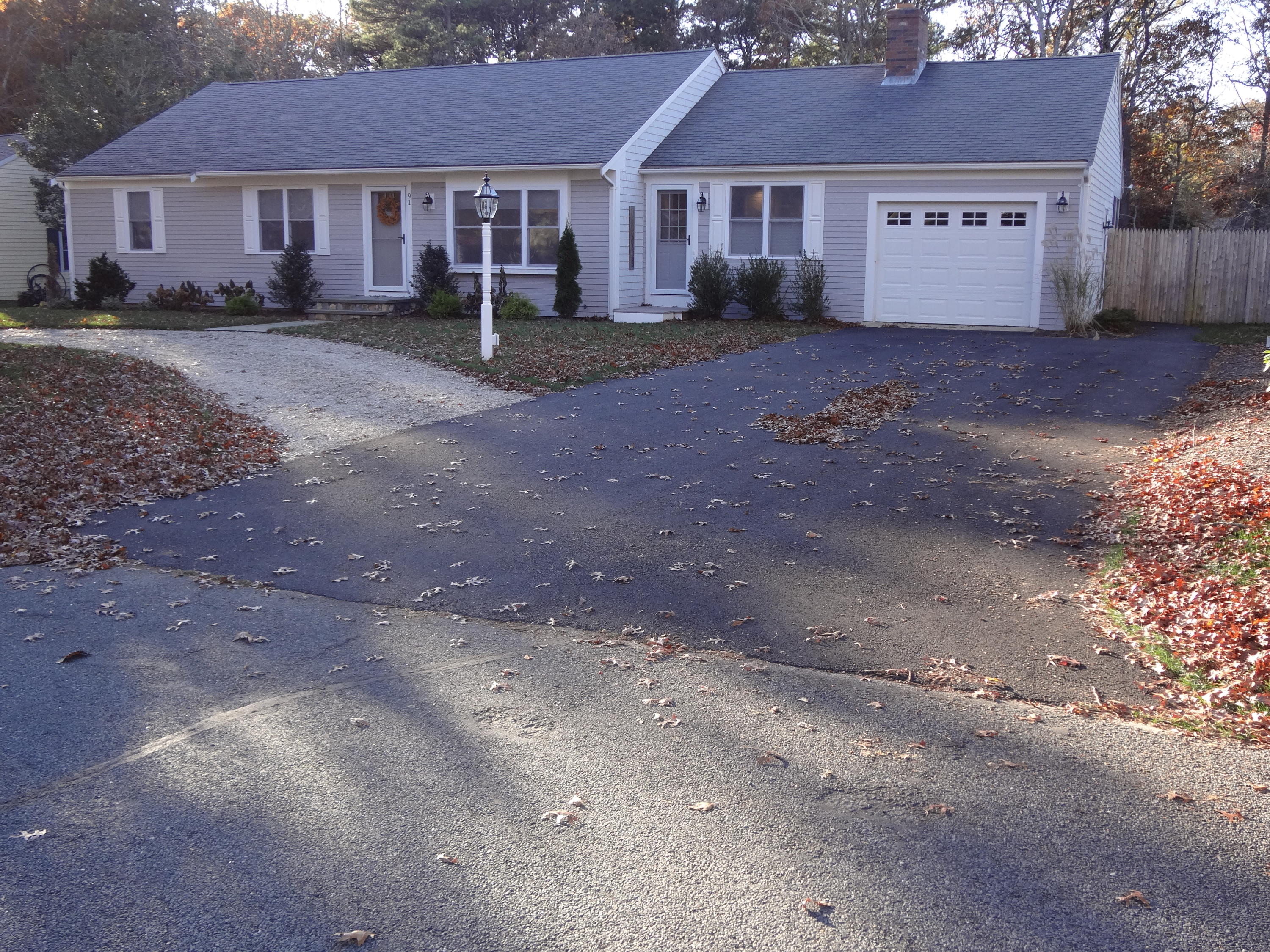 91 Ansel Howland Road Centerville, MA 02632 - Photo 1 of 30 a view of a house with a yard