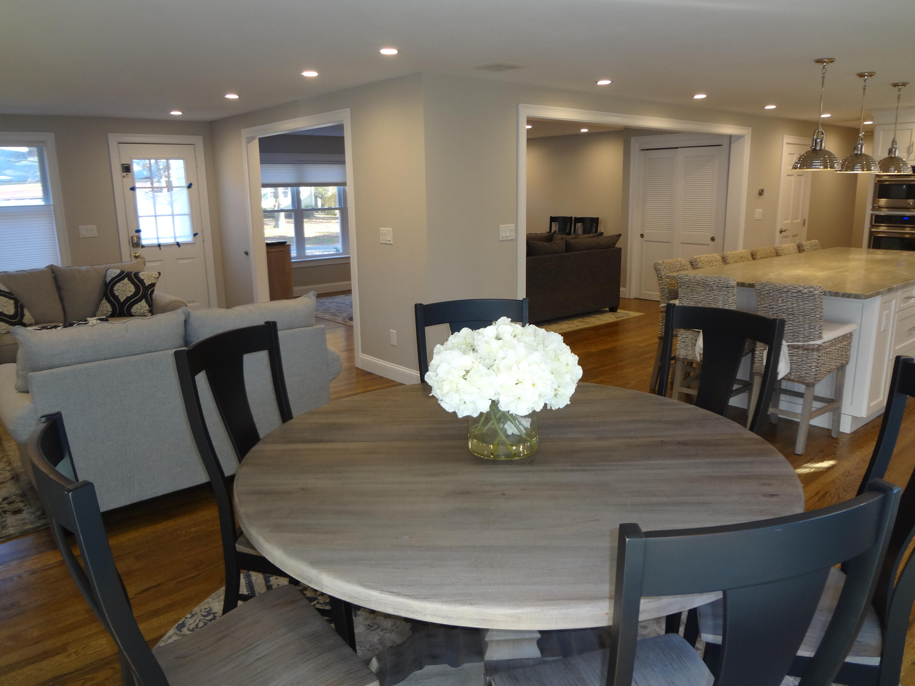 91 Ansel Howland Road Centerville, MA 02632 - Photo 14 of 30 a view of a dining room with furniture