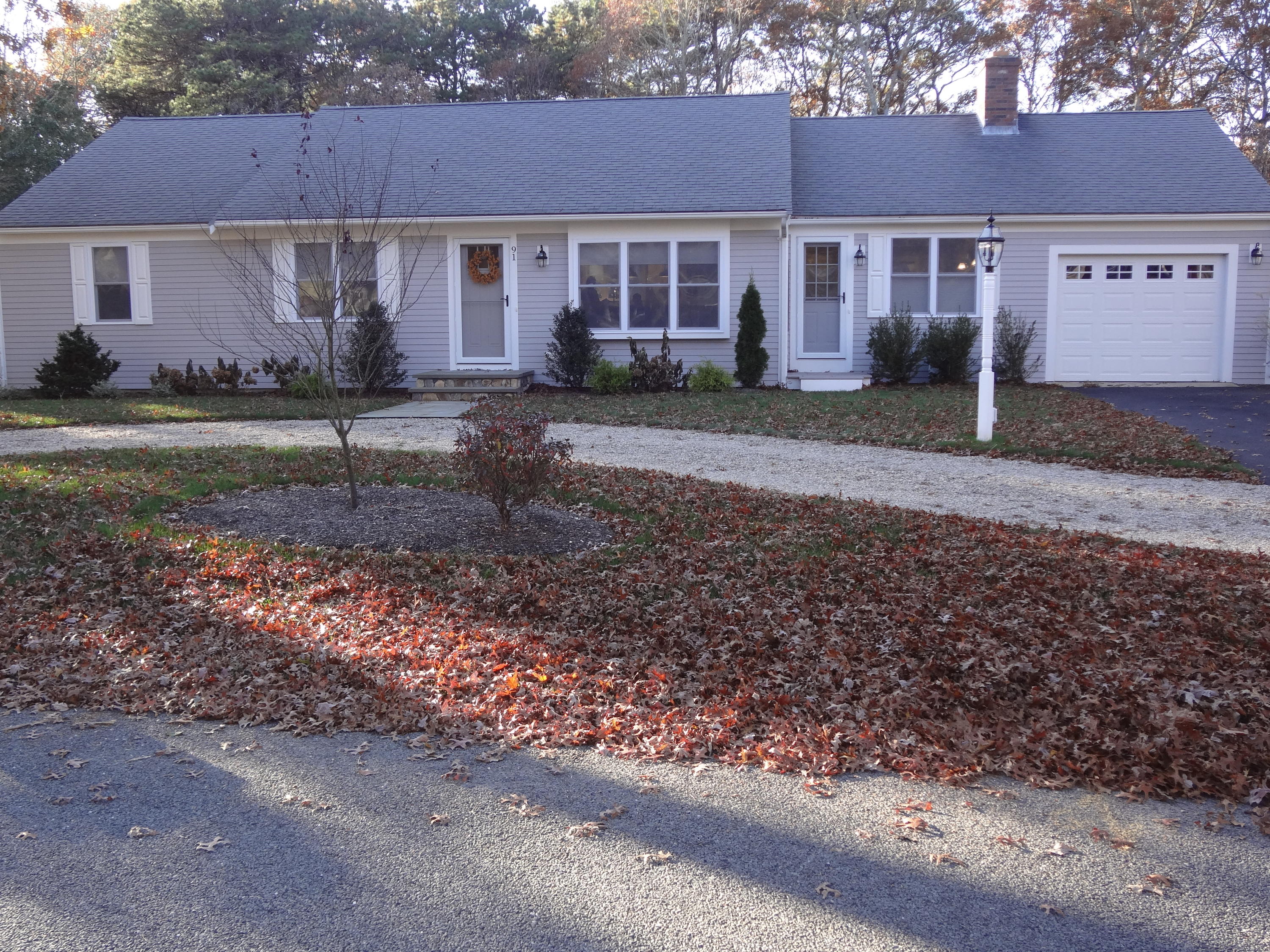 91 Ansel Howland Road Centerville, MA 02632 - Photo 2 of 30 a view of a house with a yard