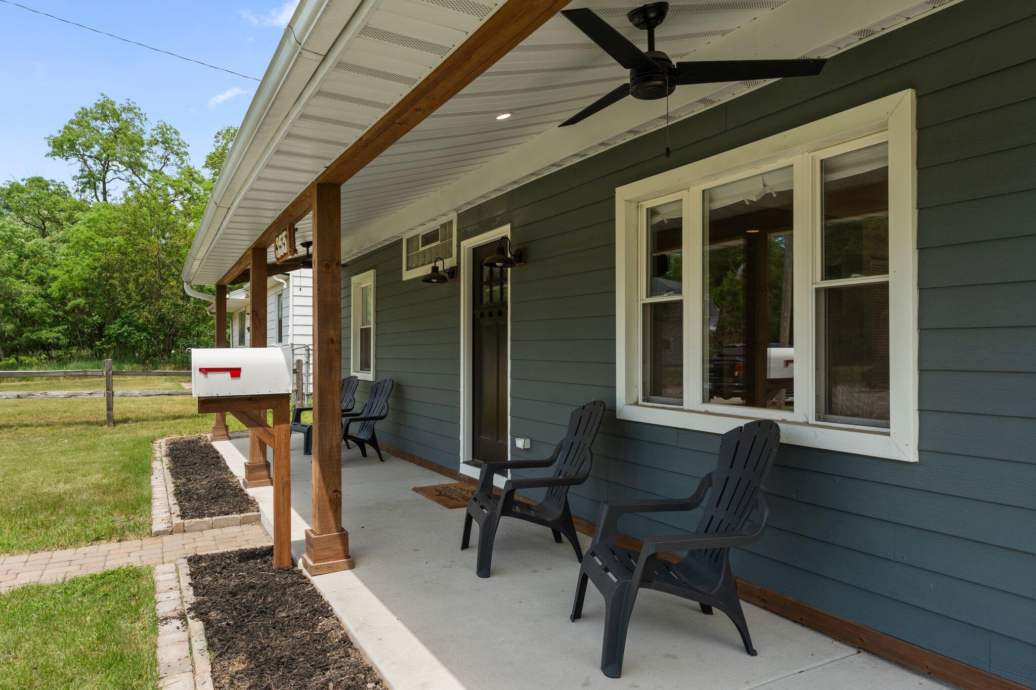 355 South Howard Street Gary, IN 46403 - Photo 16 of 16 a view of a porch with furniture and a yard