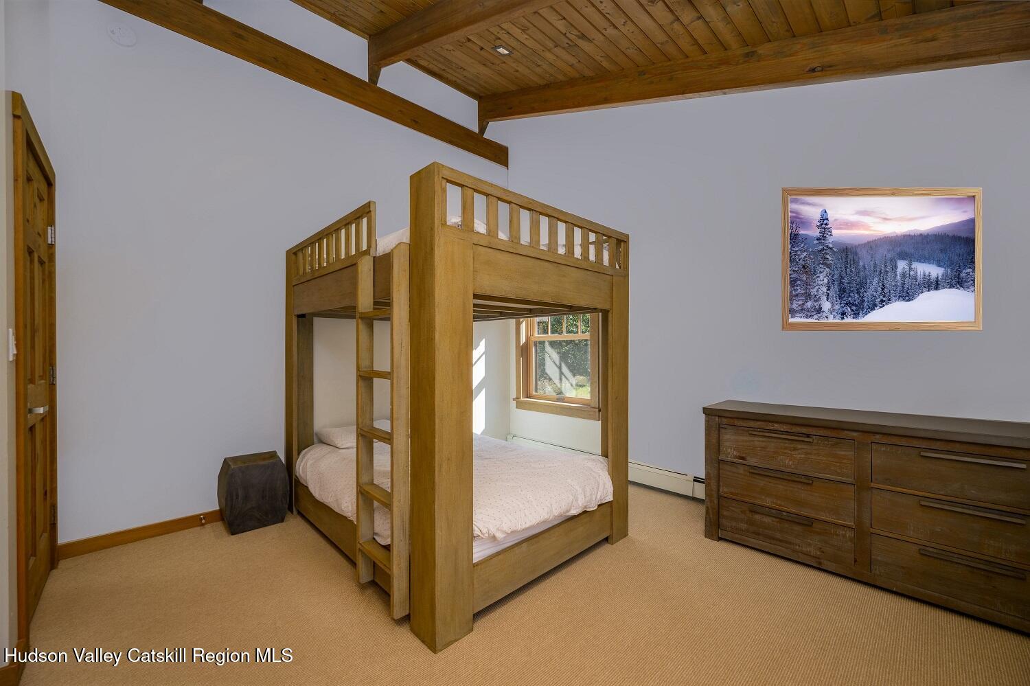 209 Club Road Windham, NY 12496 - Photo 11 of 18 a bedroom with a bed and a window