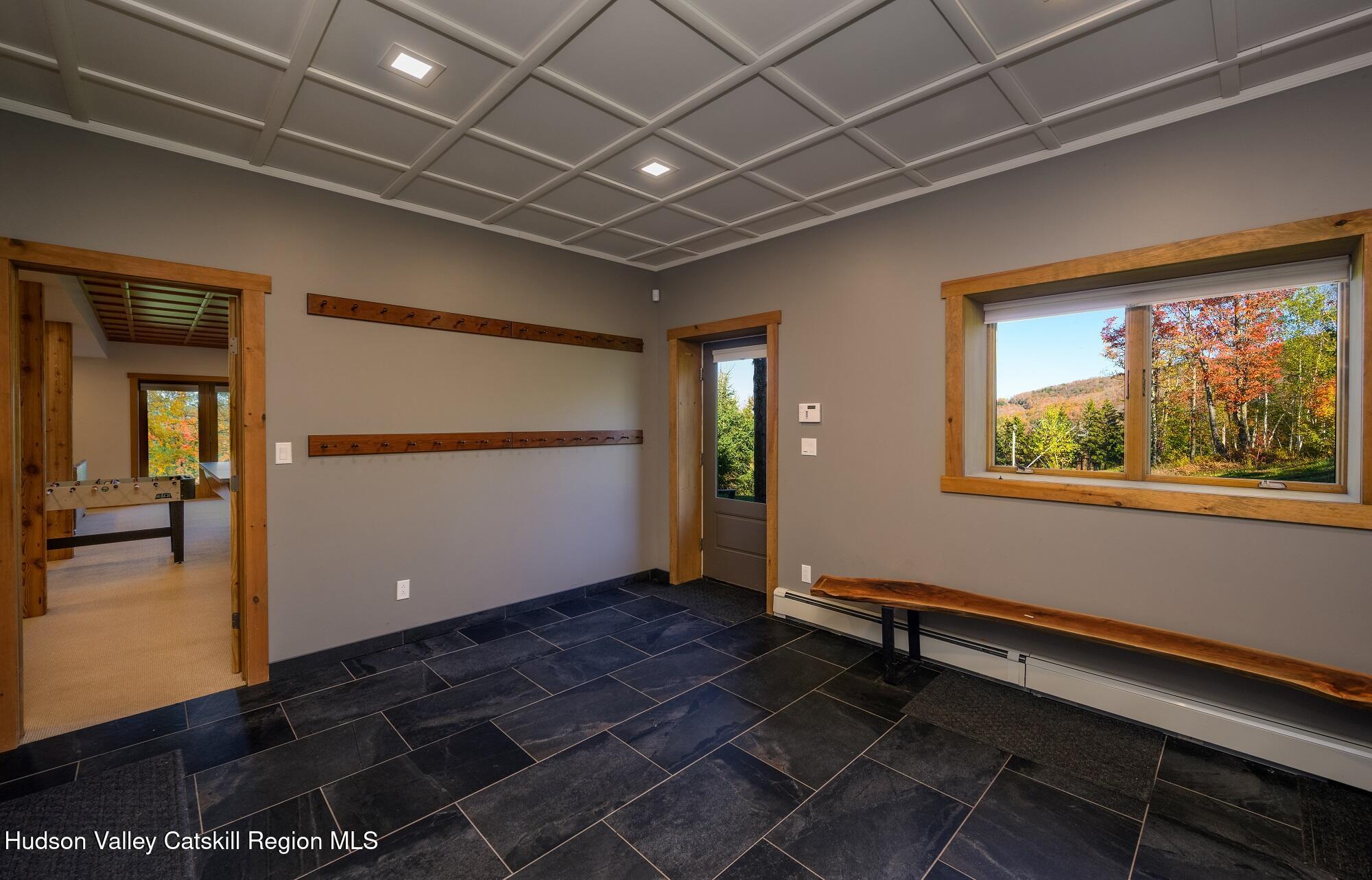 209 Club Road Windham, NY 12496 - Photo 13 of 18 a room with furniture and wooden floor