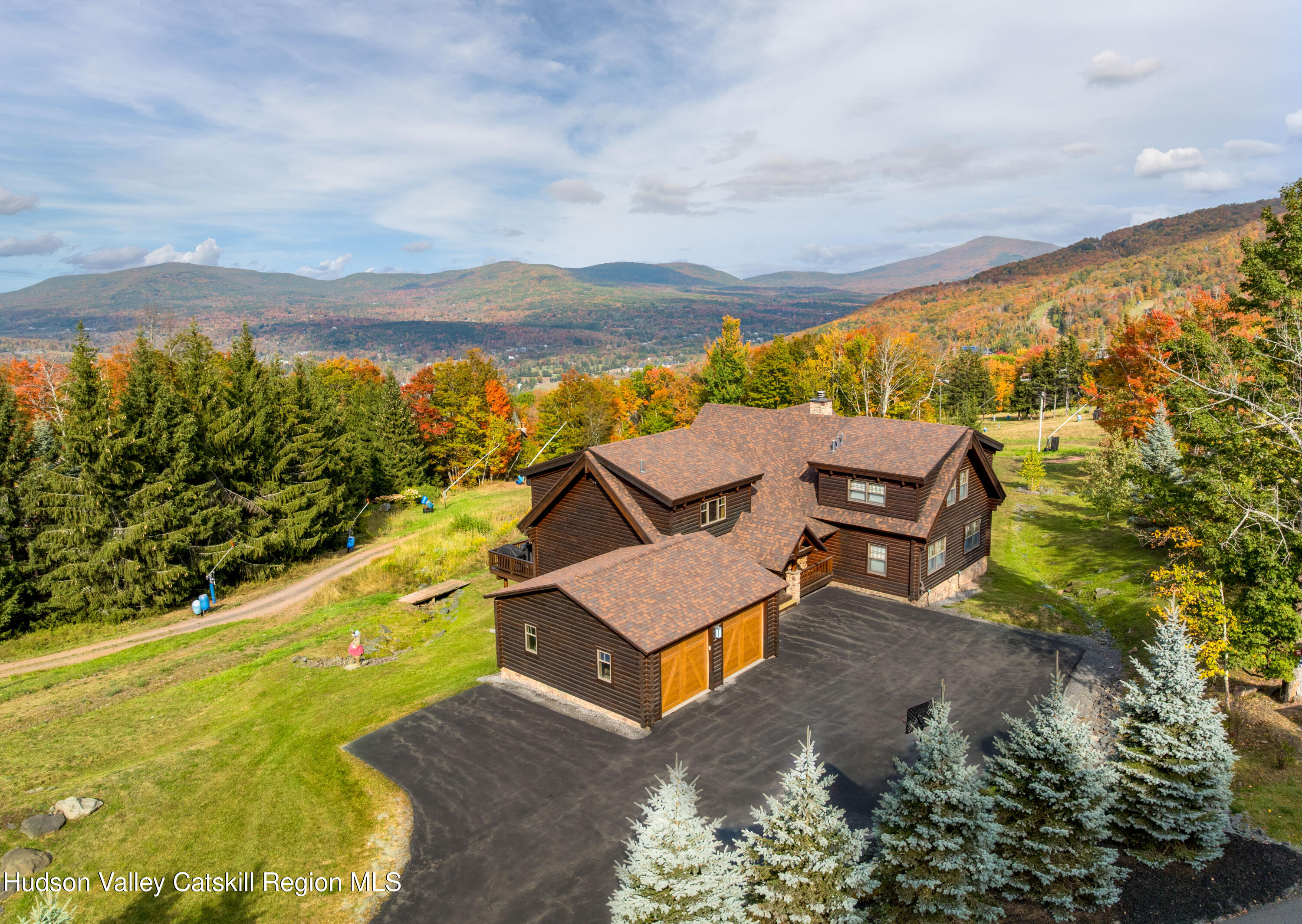 209 Club Road Windham, NY 12496 - Photo 2 of 18 an aerial view of a house with a yard pool outdoor seating and yard