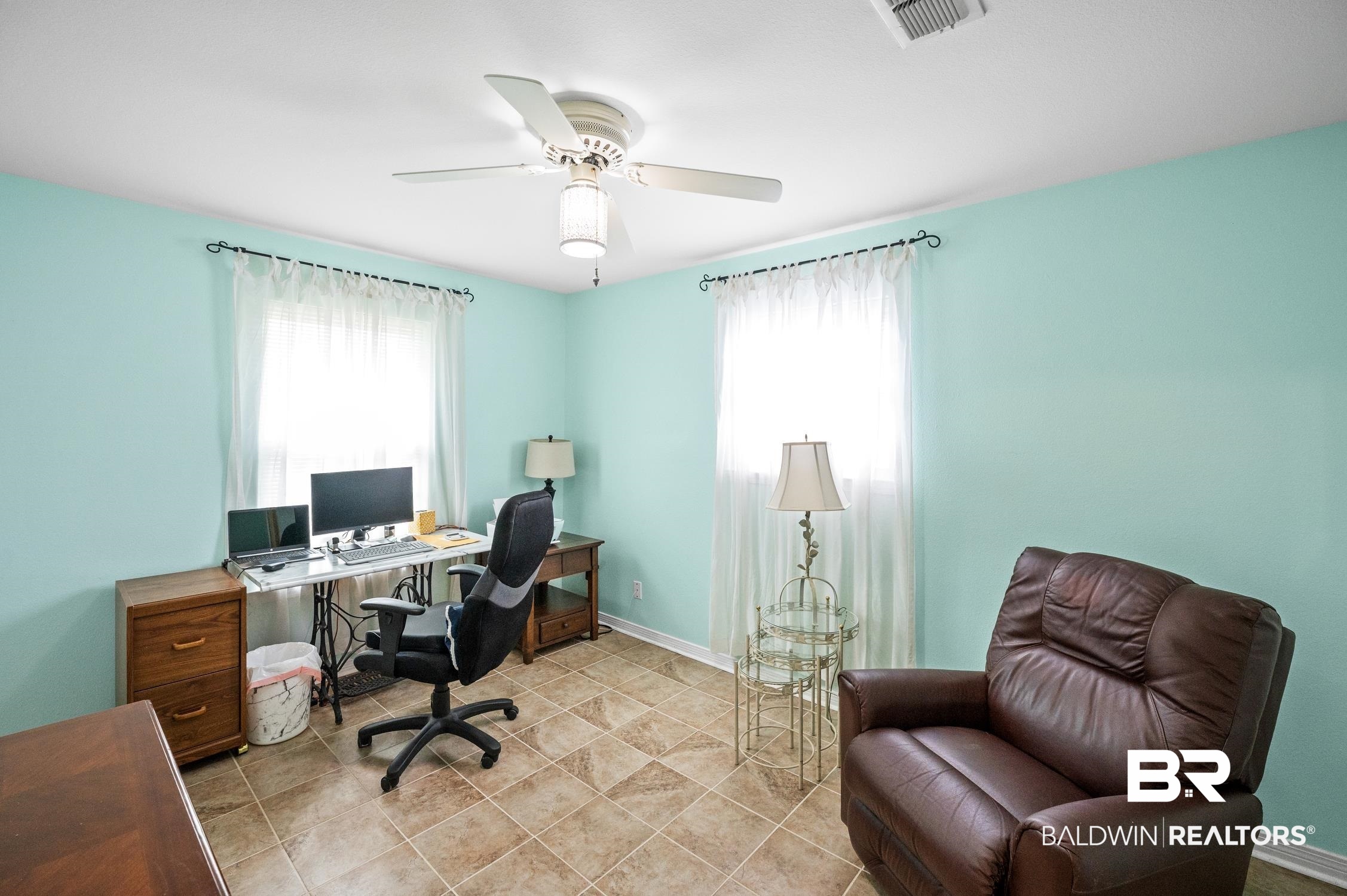 2553 Santa Rosa Drive Lillian, AL 36549 - Photo 33 of 51 Home office featuring ceiling fan, a wealth of natural light, visible vents, and baseboards