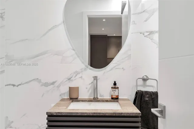 a view of staircase with wooden floor and potted plant
