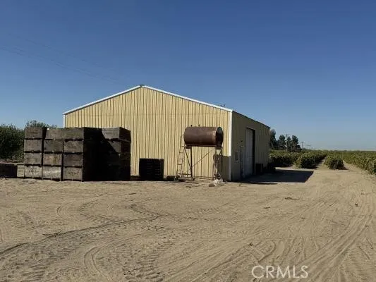 a view of a house with a snow in the yard