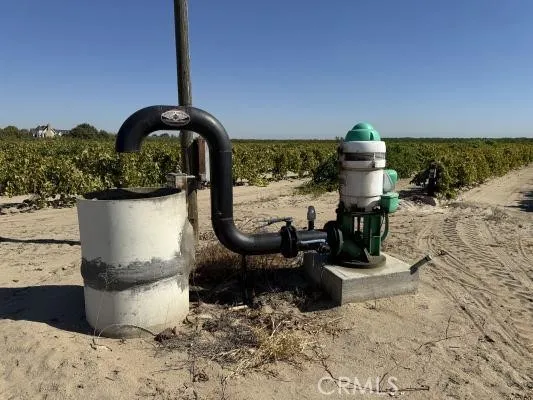 a close view of a sink with a dining table and chair