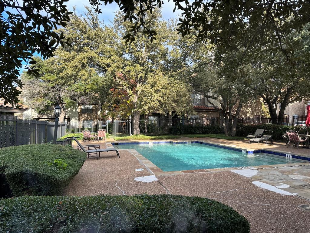 336 Melrose Drive, Unit 7B Richardson, TX 75080 - Photo 18 of 18 Community pool with a patio