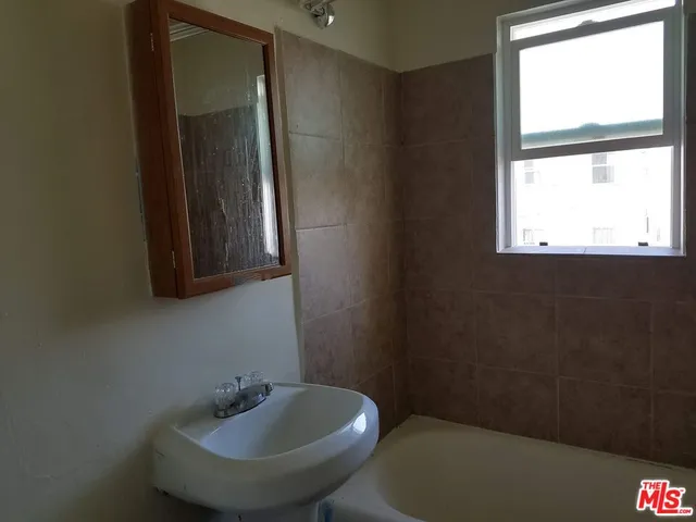 a bathroom with a sink and a toilet