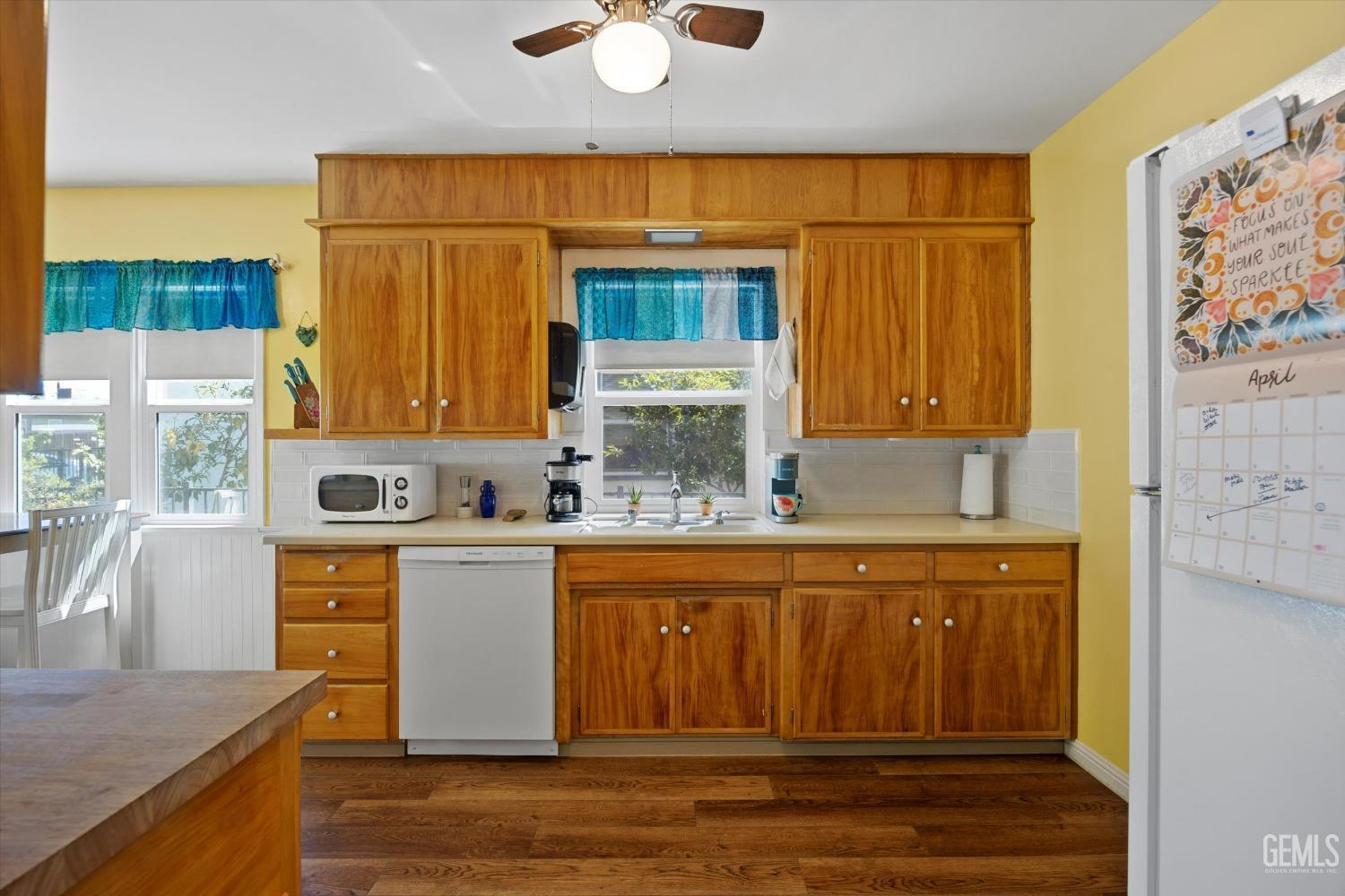 Undisclosed Address Bakersfield, CA 93305 - Photo 20 of 39 a kitchen with stainless steel appliances granite countertop a sink window and cabinets