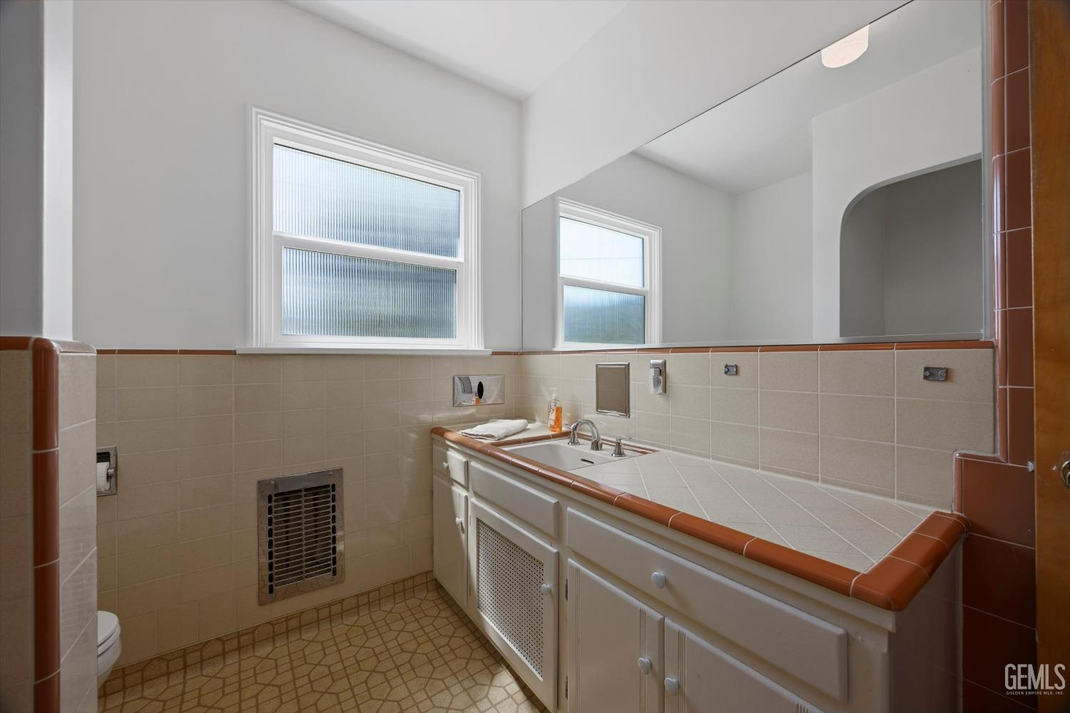 Undisclosed Address Bakersfield, CA 93305 - Photo 24 of 39 a utility room with sink dryer and washer